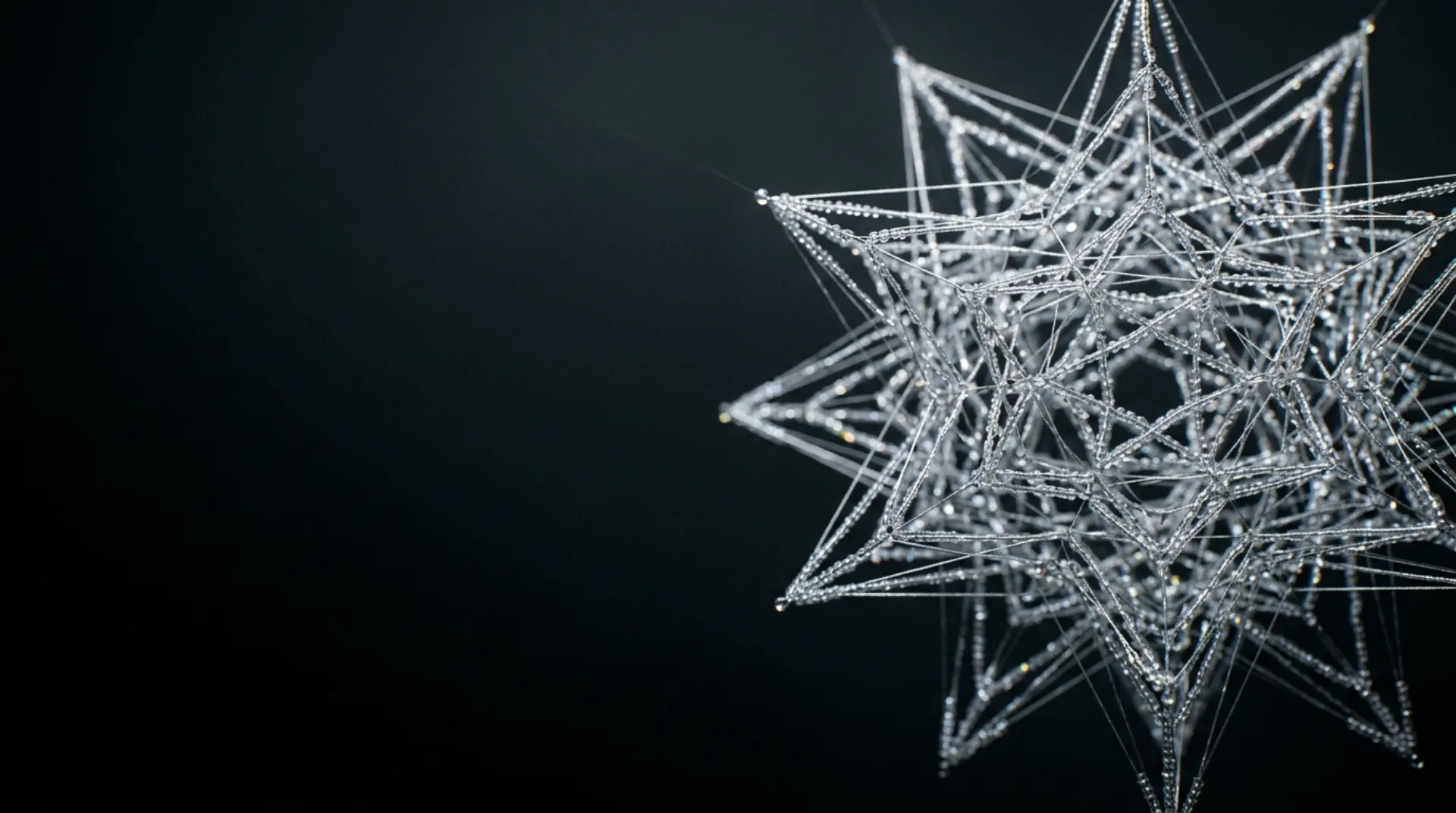 A dense star-shaped lattice of glass beads and silver threads on a dark background, abstract hero artwork for GPT-6 Astra Pro